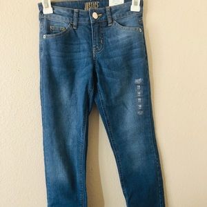 Brand new pair of Justice Skinny mid-rise jeans
